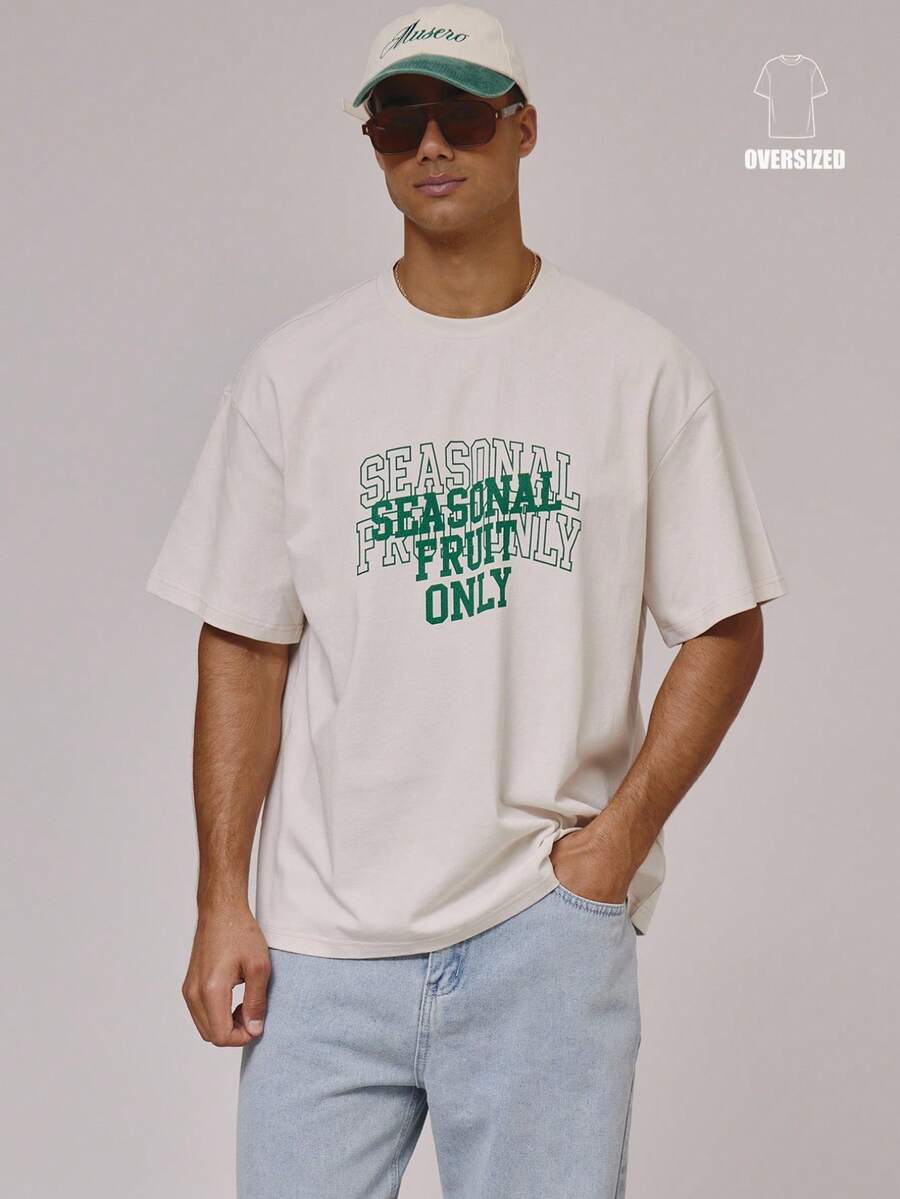 Musero Camiseta de manga corta oversize con eslogan gráfico de gran pecho, hombros caídos, esencial para primavera y verano - Camel - Ver 1