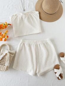 Bộ đồ mùa hè cho bé gái, thích hợp đi biển, gồm áo croptop dây mảnh trong suốt và quần short, chất liệu vải dệt họa tiết ôm sát. - trắng - Xem 3