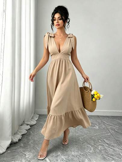 Elenzga Vestido de línea A con volantes largos en el bajo, escote en V, lazo y cintura estilizadora, talla grande
