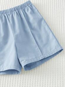 Cozy Pixies Bộ vest lịch lãm 3 món cho bé trai/bé gái: Áo sơ mi trắng tay ngắn, áo vest xanh lá cây và quần short/quần dài. Trang phục thanh lịch cho mùa xuân/hè, phù hợp cho tiệc sinh nhật, lễ rửa tội, sinh nhật lần thứ nhất, lễ kỷ niệm, đám cưới, v.v. - Màu xanh nhạt - Xem 5