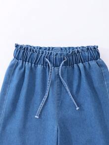 SHEIN 少女夏季复古休闲学院风百搭简约风牛仔裤，碎花松紧腰蓝色阔腿牛仔裤，宽松直筒版型，轻盈透气面料，抽绳设计，可搭配T恤、衬衫或针织衫日常穿着。 - 淺色水洗藍 - 查看 6