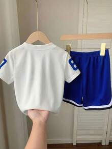 SHEIN Little Byeori Bộ 2 món đồ cho bé trai, phong cách thể thao thường ngày, sinh viên, đường phố, dễ thương, thích hợp cho kỳ nghỉ, đi nghỉ mát, áo khoác cardigan in chữ kiểu áo bóng chày và quần short, phù hợp cho trang phục trẻ em, quần áo bé trai đi học, thích hợp cho tiệc sinh nhật, tiệc tối, biểu diễn, đám cưới, lễ rửa tội, lễ khai trương, sử dụng hàng ngày, thích hợp cho đi học, thích hợp cho du lịch, thích hợp cho thể thao, thích hợp cho mùa xuân và mùa hè. - Nhiều màu - Xem 5