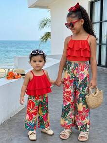 SHEIN Playful Pals 两件套女童碎花宽松吊带背心+裤子，度假风休闲夏季套装。色彩缤纷的碎花吊带背心套装，采用舒适透气的面料，宽松版型设计，适合女孩日常穿着、户外玩耍或家庭聚会。 - 彩色 - 查看 9