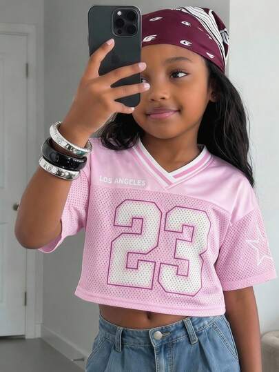SHEIN Young Girl's Fashion Street V-Neck Pink Mesh Letter & Number Print Loose Crop Top T-Shirt, Soft & Comfortable Sports Tee For Music Festival Or Sports Event