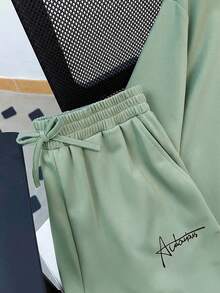 SHEIN 2 pezzi/set Maglietta a maniche corte e pantaloncini casual, versatili e comodi con stampa di lettere di alto valore per ragazzi adolescenti, stile urbano e casual - Menta Verde - Visualizzare 5