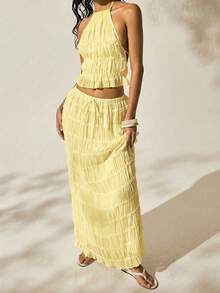 Easelle Conjunto de top halter sin espalda y falda de cintura baja de estilo romántico para vacaciones en color amarillo mantequilla, conjunto de 2 piezas para mujer, conjunto de verano para vacaciones - Amarillo - Ver 3