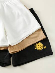 SHEIN Bộ 3 món gồm áo ba lỗ và quần short in hình mặt cười cho bé trai/bé gái, kiểu dáng thường ngày, phong cách đường phố mùa hè. - màu đen - Xem 7