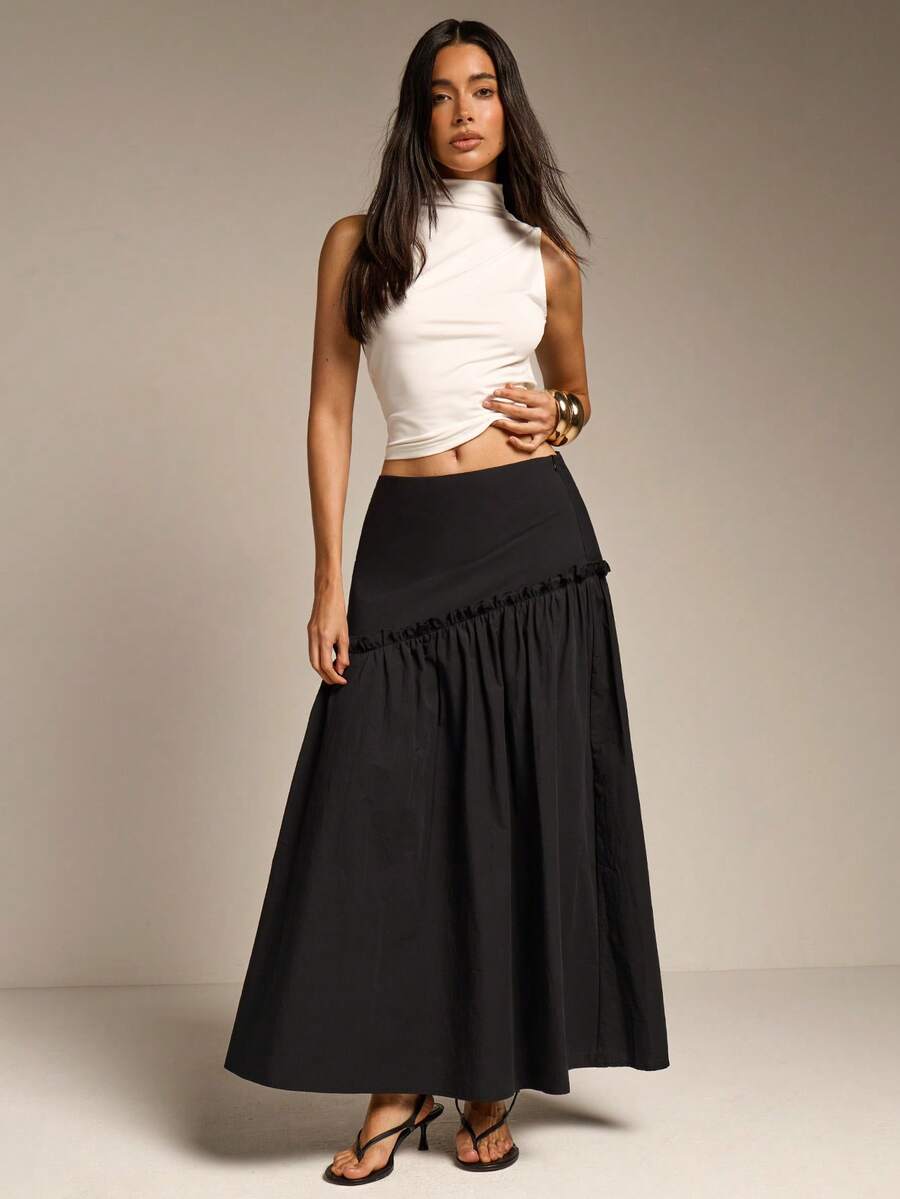COSMINA Falda elegante de mujer con volante asimétrico en el bajo, versátil para ir al trabajo, la oficina, salidas y citas de primavera - Negro - Ver 1