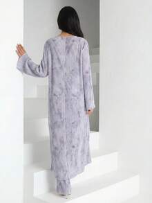 Bộ 2 món gồm áo dài tay in họa tiết toàn thân và quần cạp chun cho nữ. - Nhiều màu - Xem 2