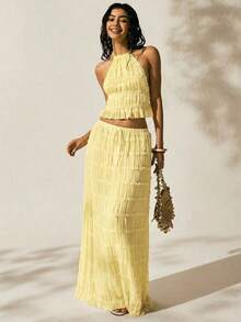 Easelle Conjunto de top halter sin espalda y falda de cintura baja de estilo romántico para vacaciones en color amarillo mantequilla, conjunto de 2 piezas para mujer, conjunto de verano para vacaciones - Amarillo - Ver 6