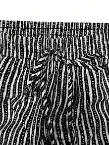 Bermudas de pierna ancha con cordón en la cintura, a rayas verticales en blanco y negro - Negro - Ver 4