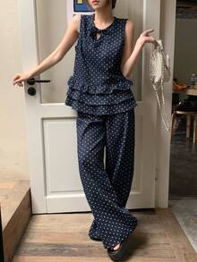 DAZY Bộ đồ nữ gồm áo không tay cổ buộc dây chấm bi và quần jeans ống rộng. - Màu xanh lam - Xem 6
