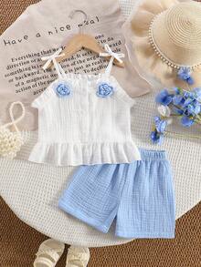 SHEIN Bộ 2 món cho bé gái: Áo hai dây cổ bèo và quần short hoa xanh, trang phục mùa hè dễ thương, giản dị kiểu đồng quê. - Màu xanh lam - Xem 1