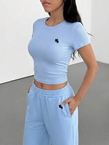 Muchica Women's Knight Print Pleated Short Sleeve Top And Pants Casual 2 Pieces Set - Baby Blue - View 4