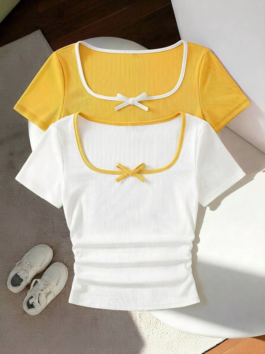 SHEIN Set de 2 camisetas de manga corta con cuello en U, fruncido y decoración de lazo en color contrastante, cómodas y casuales para niñas preadolescentes - Amarillo - Ver 1