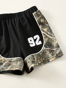 SHEIN Bộ 2 món đồ cho bé trai/bé gái, kiểu dáng thường ngày, phối màu thời trang, họa tiết rằn ri, áo thun ngắn tay và quần short, bộ quần áo mùa hè cho bé trai, phong cách đường phố, áo thun trẻ em. - màu đen - Xem 5