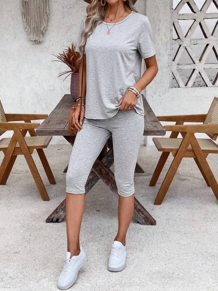 Women's Solid Color Round Neck Short Sleeve Top And 7/8 Pants Casual 2 Pieces Set Two Piece Casual Sets Matching Lounge Set Women Outfit For Women Set Casual Leisure Sets For Women 2 Piece Comfy Sets Woman Summer Outfits For Women Two Piece Set Women Summer Two Piece Set Capri Two-Piece Set 2-Piece Going Out Sets For Women Matching Sets For Women Cotton Women's Clothing