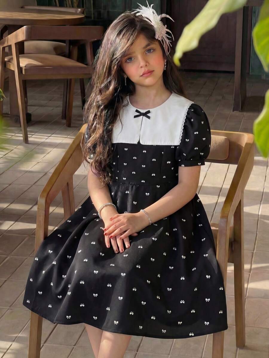 1件少女束腰甜美黑白撞色蝴蝶结装饰花瓣袖蝴蝶结印花连衣裙，优雅适合派对、学校、聚会等场合