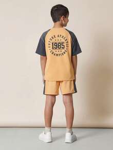 SUMWON Regular Boys Raglan Tee And Shorts Co-Ord Set With Future Athletic Champions 1985 Print - Orange - View 2