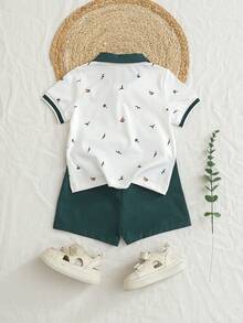 SHEIN 这款幼儿男童夏季休闲两件套，包含一件棕榈树和小船印花翻领Polo衫和一条松紧腰短裤，时尚舒适，适合6个月至3岁的男童，是日常穿着、户外活动和返校的理想之选。 - 墨綠色 - 查看 2
