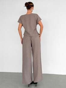 Siren Gaze Damen 2-teiliges Outfit Pastell Sommer elegant sexy Business Lässig elegant Büro Golf V-Ausschnitt Wickeloberteil Slim Fit weite Hose Set asymmetrische Knopfleiste - Aprikosenfarben - Übersicht 2