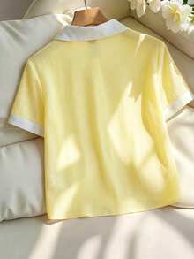 Franclia Áo kiểu nữ cỡ lớn màu hồng thanh lịch mới cho mùa hè, chất liệu chiffon, cổ trắng, dáng rộng, tay ngắn. Thích hợp cho mùa hè, lễ hội và các dịp nghỉ lễ. Đặc điểm nổi bật: cúc kim loại trang trí, kiểu dáng đa năng, cổ áo tương phản, dáng rộng, tay ngắn và vải xếp ly. Trang phục mùa tốt nghiệp, trang phục công sở thời trang, trang phục thường ngày năng động, trang phục chuyên nghiệp thành thị. - Màu vàng - Xem 2