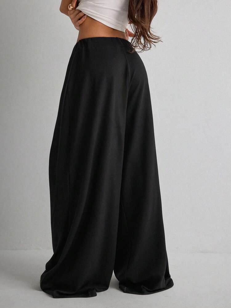 Women's Solid Color Elastic Waist Loose Casual Flare Leg Pants - Black - View 3