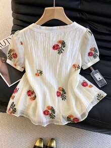 GlowEve Blusa de mujer de cuello redondo con bordado floral delicado y texturizado, nueva para el verano - Albaricoque - Ver 2