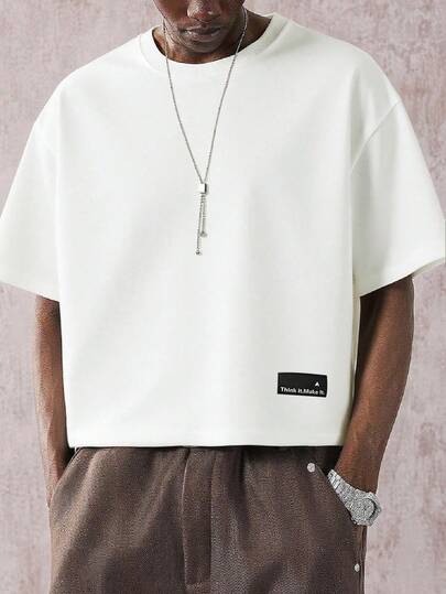 STYNVO Men's Letter Graphic Round Neck Casual Loose T-Shirt Men Boxy T Shirts Men Tops Oversized Cropped T Shirt Men Oversized