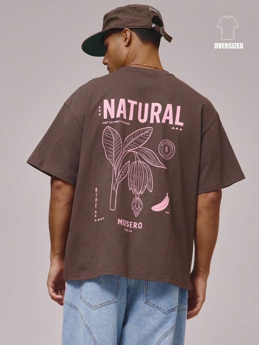 Musero Camiseta de manga corta oversize con cuello redondo y hombros caídos, con gran estampado gráfico "NATURAL" en la espalda, esencial para primavera y verano - Marrón Chocolate - Ver 1