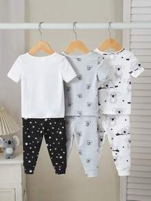 Bộ 6 món cho bé trai sơ sinh, gồm áo liền thân tay ngắn cổ tròn in hình gấu Koala hoạt hình dễ thương và quần short, chất liệu mềm mại, thoải mái. - Đen và trắng - Xem 2