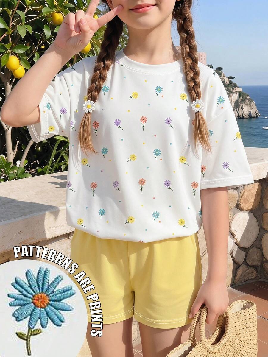 SHEIN Sparklyn 少女彩色花卉印花图案T恤套装,白色宽松圆领短袖T恤搭配黄色短裤,两件套,夏季设计,百搭基础款,适合户外休闲穿着,舒适柔软。圆领T恤和短裤套装,适合春夏日常、居家、度假、节日等场合,充满春日气息,清爽宜人。春夏外出穿搭,轻松舒适,时尚少女套装,休闲服饰,花卉图案服装,春夏套装,新款,清凉舒适,春日清爽,夏日假期必备。 - 彩色 - 查看 1