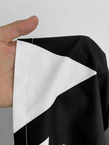 Maweii French Vacation Style Fashionable Printed Plunging Neck Jumpsuit, Waist Cinching Flared Leg Pants For Summer - Black and White - View 8