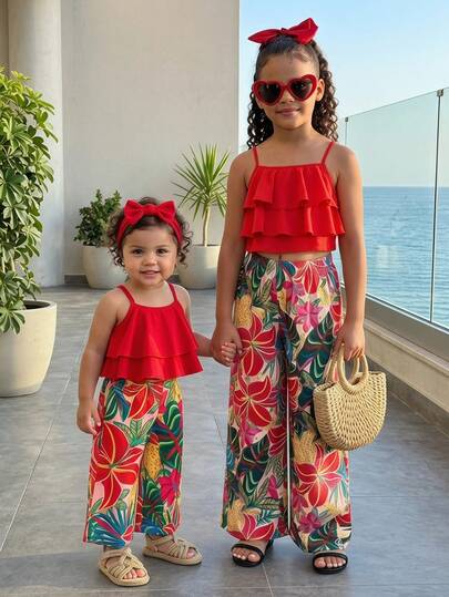 SHEIN Playful Pals 2pcs/Set Toddler Girls' Floral Print Loose Camisole Top + Pants, Vacation Style Casual Summer Outfit. Colorful Floral Print Camisole Set With Comfortable, Breathable Fabric, Loose Fit Design, Suitable For Girls' Daily Wear, Outdoor Play Or Family Gathering.