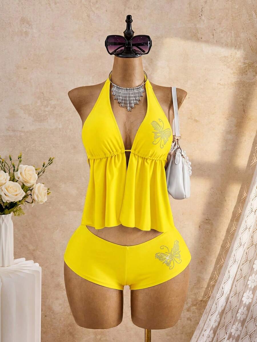 Bellisia Bộ đồ bơi tankini màu đen đính đá và hoa, thích hợp cho kỳ nghỉ biển mùa xuân/hè 26SS.