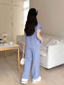 SHEIN Bộ đồ hai mảnh cho bé gái tuổi teen, gồm áo thun ngắn tay cổ trễ vai phối màu, chất liệu dệt kim, có dây buộc và nơ, thích hợp cho mùa tựu trường/Ngày lễ tình nhân/Mùa hè. - Màu xanh nhạt - Xem 5