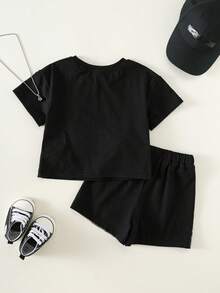 SHEIN Bộ 2 món đồ cho bé trai/bé gái, kiểu dáng thường ngày, phối màu thời trang, họa tiết rằn ri, áo thun ngắn tay và quần short, bộ quần áo mùa hè cho bé trai, phong cách đường phố, áo thun trẻ em. - màu đen - Xem 2