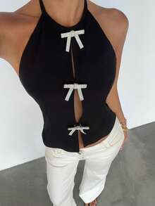 DAZY Áo tank top mùa hè thanh lịch, gợi cảm, thắt nơ đính đá, dáng ngắn, cổ yếm, hở lưng dành cho nữ. - màu đen - Xem 5