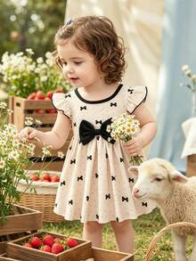 SHEIN Baby GirlApricot & Black Polka Dot Bow Print Dress With Cute Bow Decor - Apricot - View 8