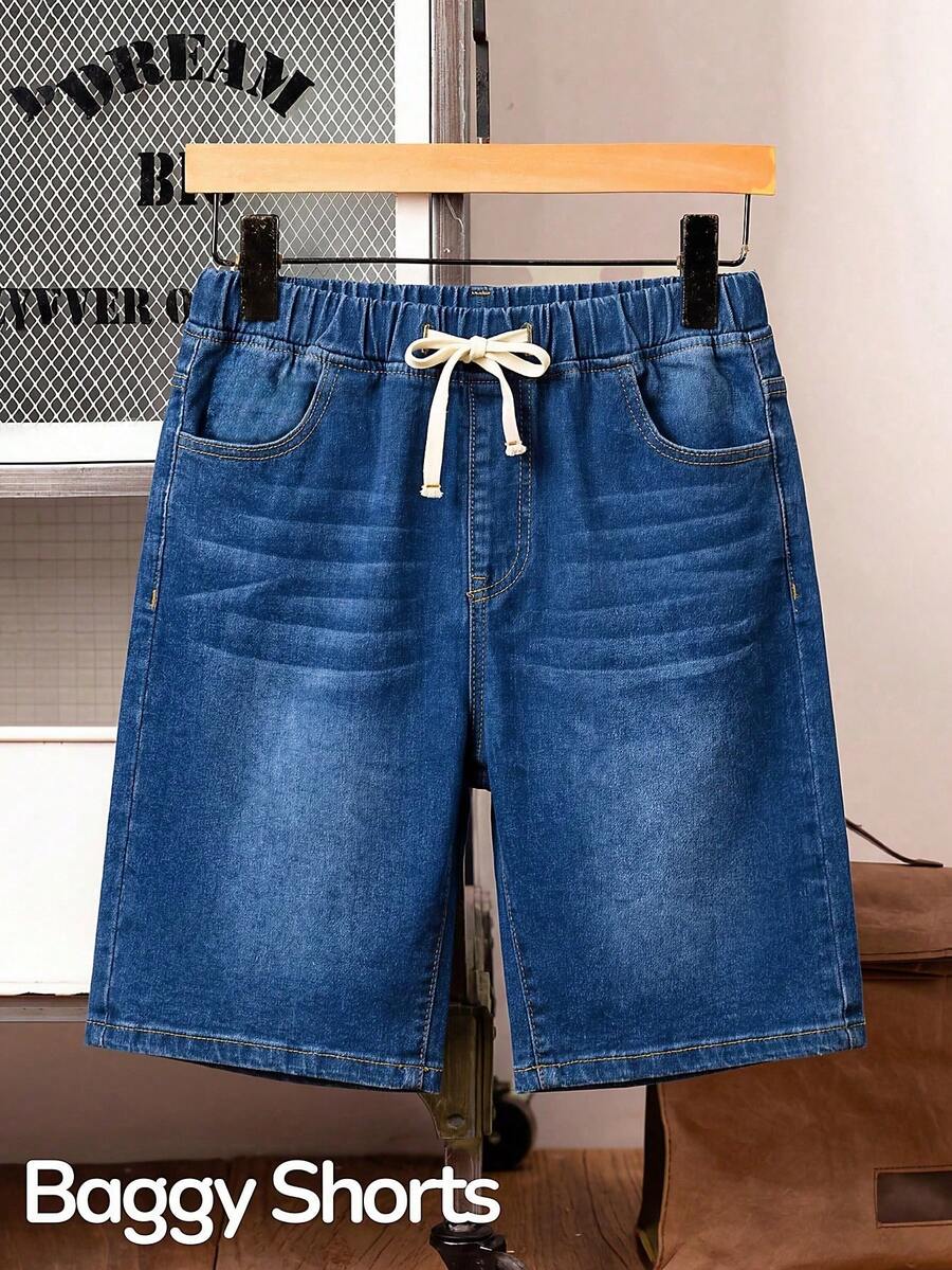 SHEIN Thời trang nam tuổi teen, phong cách đường phố, phối đồ đa năng, thiết kế cổ điển cá tính, quần short denim màu xanh đậm có dây rút, cạp chun co giãn, thoải mái và rộng rãi, thích hợp mặc hàng ngày, mùa xuân hè, đi dự lễ hội và phong cách đường phố. - Màu xanh lam - Xem 1