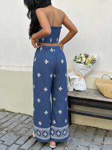 Sunnyshic Bộ đồ 2 mảnh dành cho nữ màu xanh dương in họa tiết, gồm áo quây crop top có bèo nhún và quần ống rộng cạp chun, kiểu dáng thanh lịch, gợi cảm, lãng mạn, thích hợp cho kỳ nghỉ hè ở bãi biển, kết hợp phong cách Âu và Mỹ. - Màu xanh lam - Xem 2