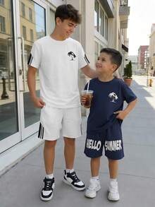2pcs/Set Teen Boys' Fashionable White T-Shirt And Shorts,Soft Comfortable Summer Streetwear Holiday Outfit For Sports,School,Outings And Photography - White - View 1