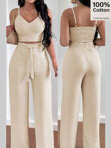 SHEIN PariChic Bộ đồ 2 món dành cho nữ màu mơ, chất liệu 100% cotton, gồm áo hai dây nâng ngực có nơ và quần ống đứng co giãn, thích hợp cho kỳ nghỉ biển. Bộ đồ đi nghỉ mát mùa xuân/hè mới, gồm áo hai dây có nơ và quần ống đứng thoải mái, chất liệu cotton 100%, 100% cotton, kèm áo hai dây nâng ngực có nơ và quần ống đứng co giãn. - Màu be - Xem 2