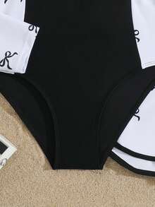 SHEIN Bộ đồ bơi liền thân dài tay có khóa kéo, màu đen trắng cổ điển, kín đáo dành cho nữ tuổi teen, kèm quần short, thời trang thanh lịch, phù hợp cho bơi lội, kỳ nghỉ hè, bãi biển, hồ bơi. - Đen và trắng - Xem 5