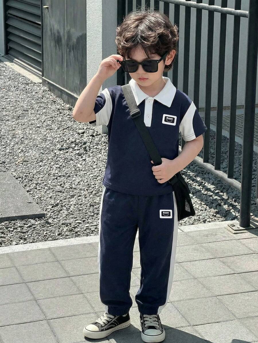 SHEIN Streecool Kids 男童休闲Polo衫长裤套装(2件套),宽松版型,撞色设计,适合日常、休闲、度假、聚会、街头风格等场合。 - 藏蓝色 - 查看 1