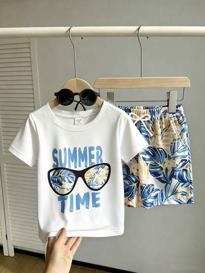 男童T恤套装，包含一件印有树叶和眼镜图案的T恤和一条印满树叶图案的短裤，面料柔软舒适，适合春夏度假、休闲外出穿着，时尚百搭。