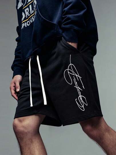 Manfinity Sport Corelite Quần short thể thao nam đa năng có dây rút ở eo và túi.
