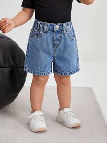 Quần short denim dáng rộng màu xanh dương thêu họa tiết nơ hồng cho bé gái. - Rửa trung bình - Xem 3