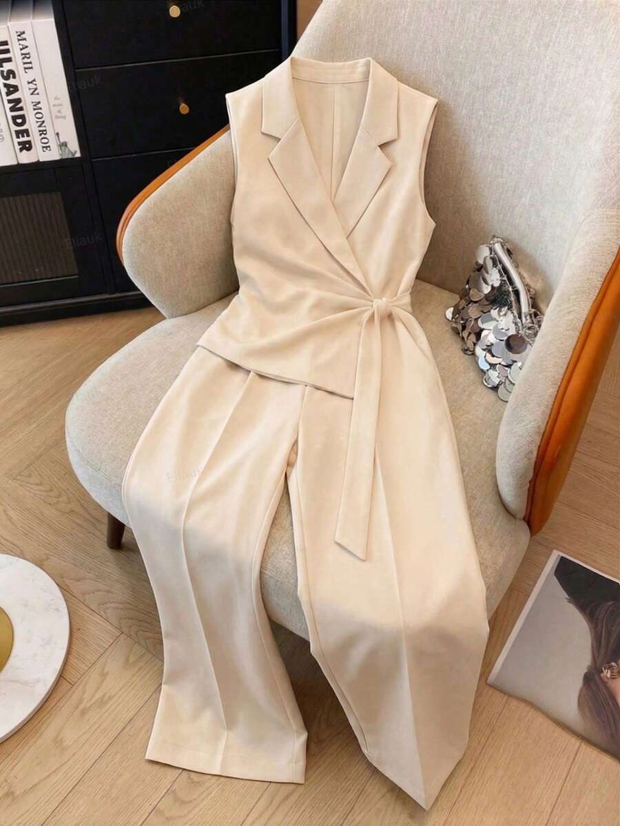 SHEIN Clasi 女士纯色亚麻混纺法式优雅休闲连体裤,翻领设计,收腰阔腿,无袖长款,适合工作、通勤、度假等场合,尽显浪漫高端风格。春夏女士连体裤套装,商务高品质连衣裙,女士正装,优雅经典。 - 杏色 - 查看 1