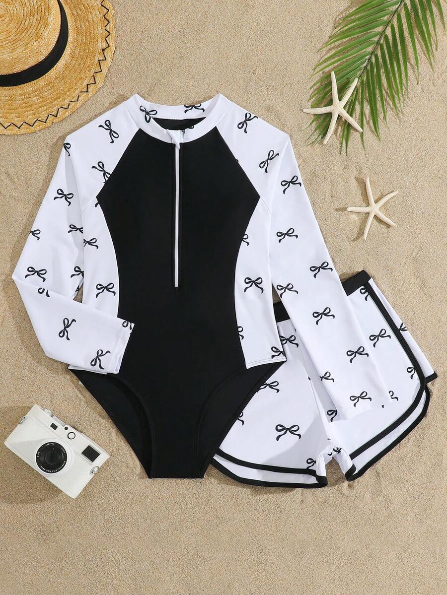 SHEIN Bộ đồ bơi liền thân dài tay có khóa kéo, màu đen trắng cổ điển, kín đáo dành cho nữ tuổi teen, kèm quần short, thời trang thanh lịch, phù hợp cho bơi lội, kỳ nghỉ hè, bãi biển, hồ bơi. - Đen và trắng - Xem 1